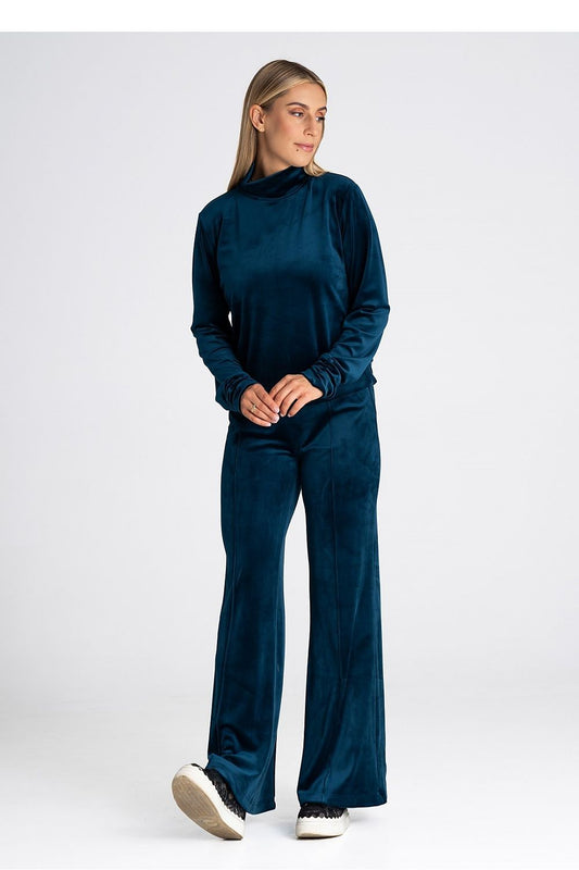 Luxury women's bell-bottom trousers made of soft velour, by Figl, showcasing a slimming silhouette.