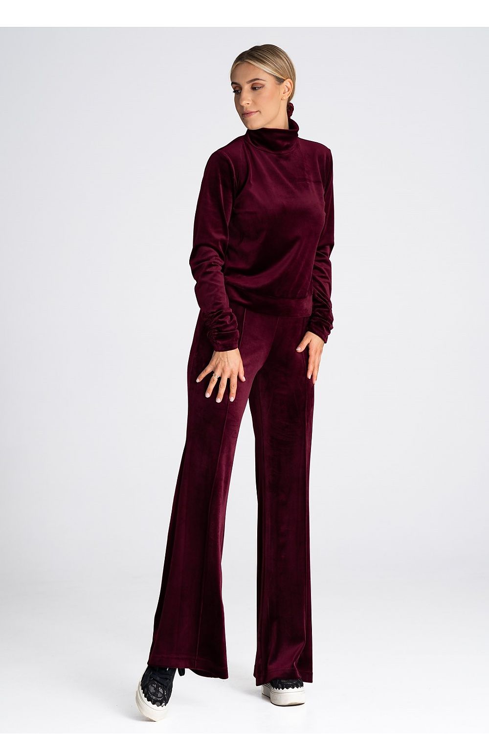 Elegant Figl women's velour bell-bottom trousers featuring a sophisticated high rise, designed for a chic and slimming silhouette.