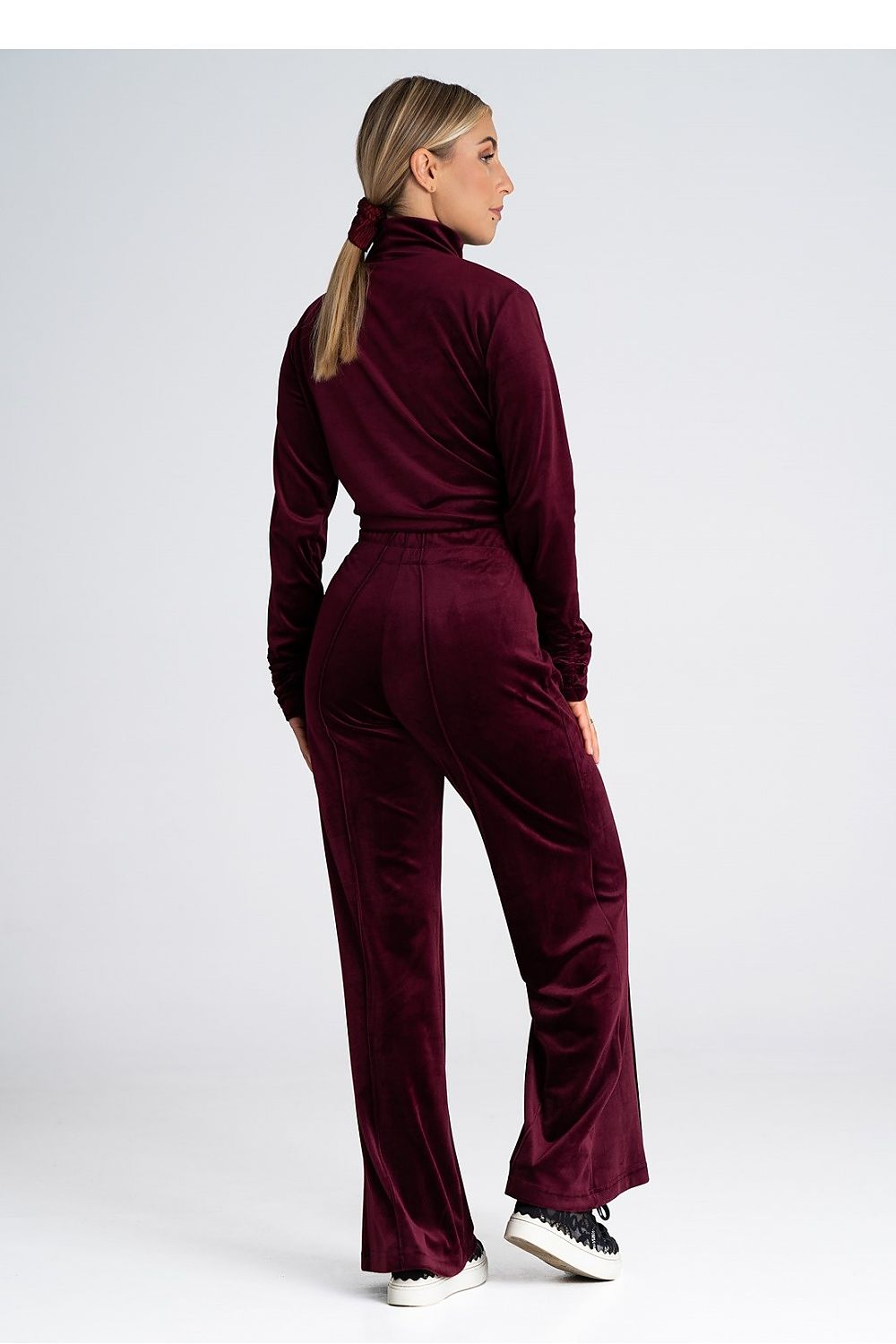 Chic and luxury women's bell-bottom trousers with a high rise by Figl, designed to accentuate the waist and enhance any outfit.