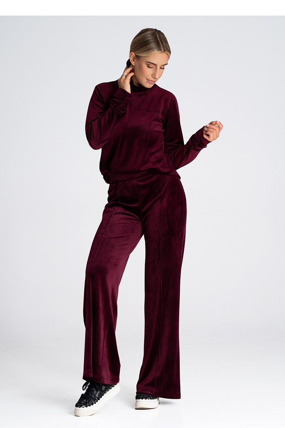 Premium quality women's velour bell-bottom trousers by Figl, featuring a high rise for a stunningly slimming appearance.