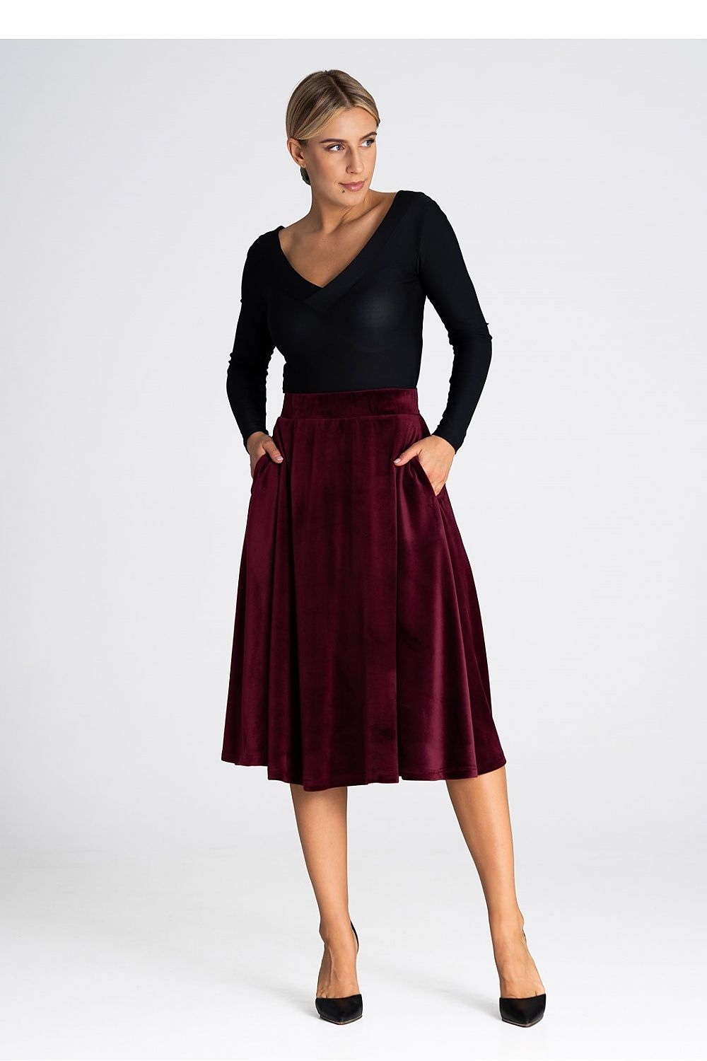 Figl premium midi skirt on display, showcasing its luxurious fabric composition of 95% polyester and 5% spandex.