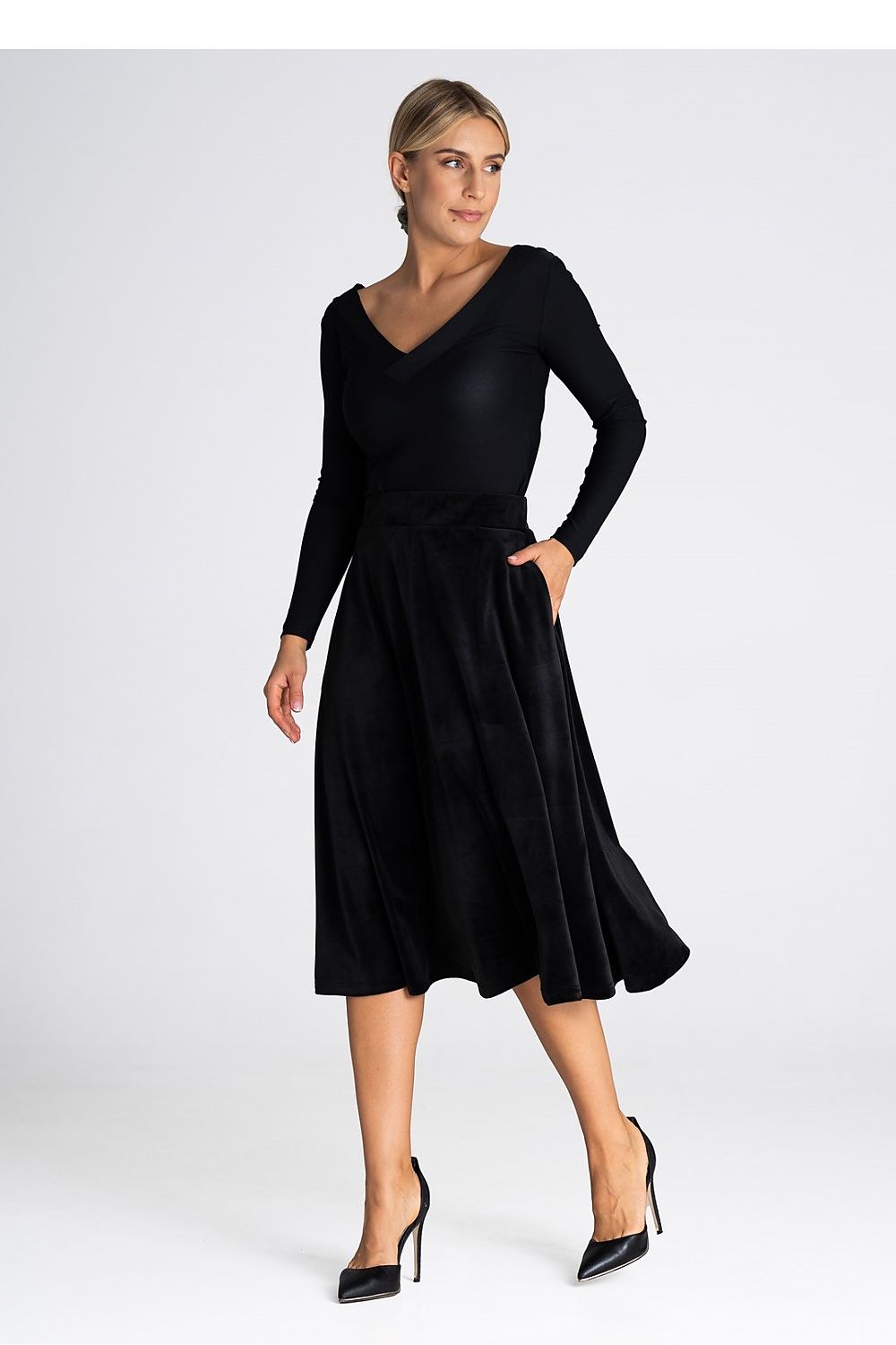 Figl's elegant midi skirt displayed, highlighting its refined design and quality craftsmanship.