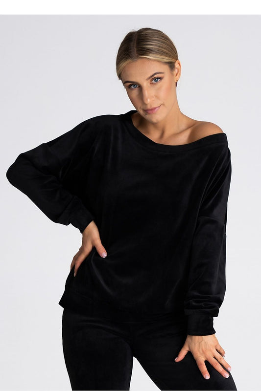 Figl oversized blouse showcasing elegant boat neckline and delicate cuffs in luxurious fabric, perfect for stylish layering.