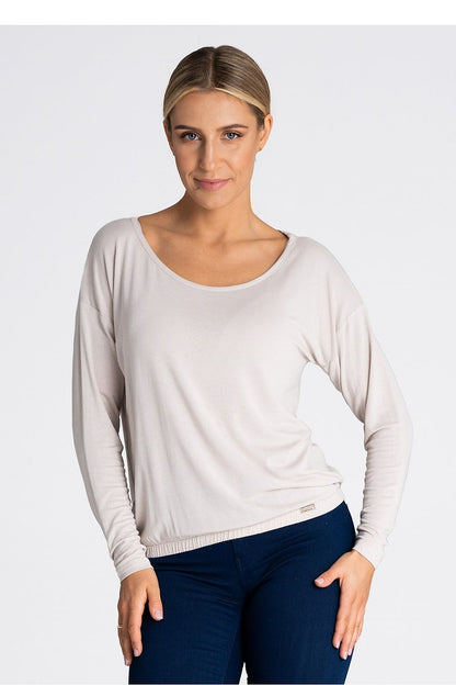 Elegant Figl Loose-Fit Blouse in fine fabric with long sleeves, showcasing a dropped shoulder design and elastic hem.