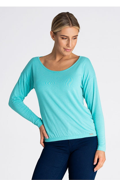 Figl Loose-Fit Blouse in Fine Fabric featuring long sleeves and elegant elastic hem, showcasing luxurious style.