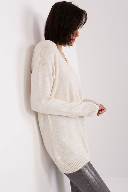 Close-up view of the luxurious long sleeve acrylic jumper by Rue Paris featuring a stylish heart neckline, ideal for casual elegance.