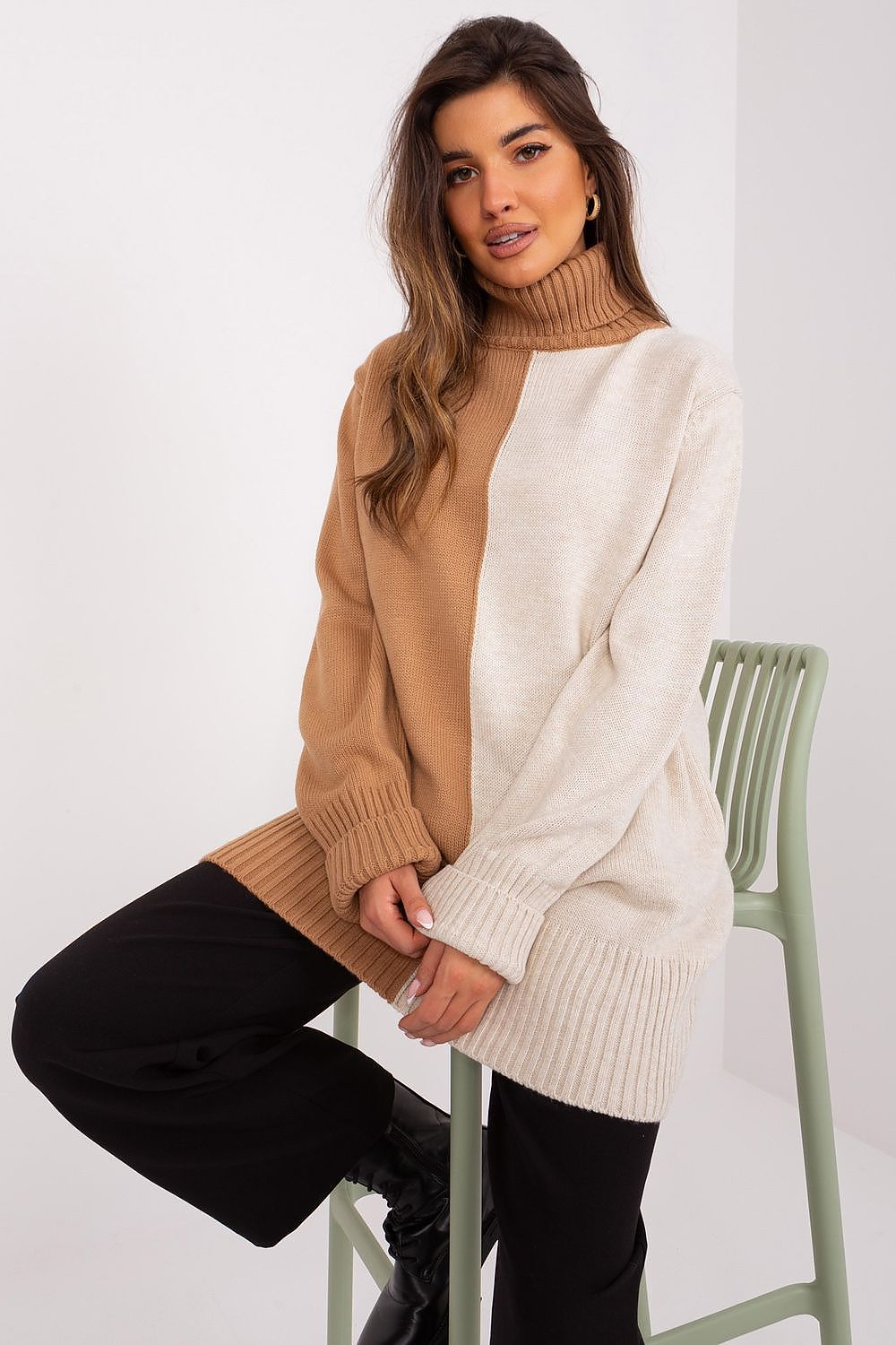 Badu two-tone acrylic turtleneck sweater displayed on a model, illustrating its versatile style for both casual and semi-formal occasions.