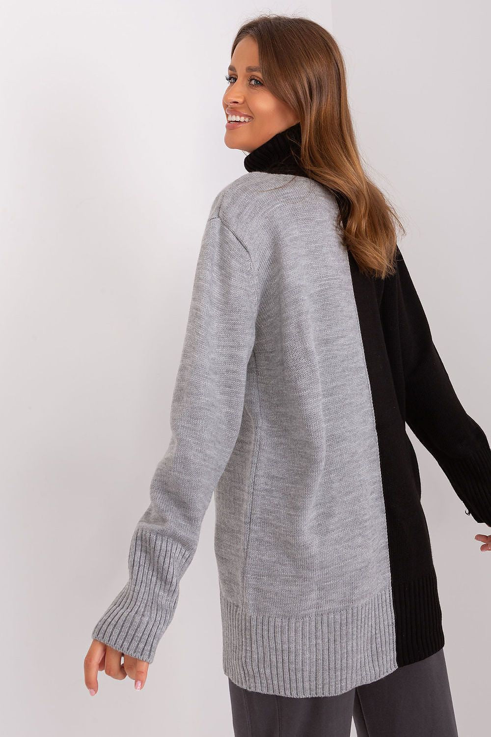 Luxurious two-tone acrylic turtleneck sweater for women by Badu, featuring a cozy mid-thigh length and stylish design, perfect for casual and elegant outfits.