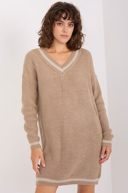 Luxurious oversized knit dress by Badu featuring a heart neckline, crafted from soft acrylic and wool blend for ultimate comfort and style.