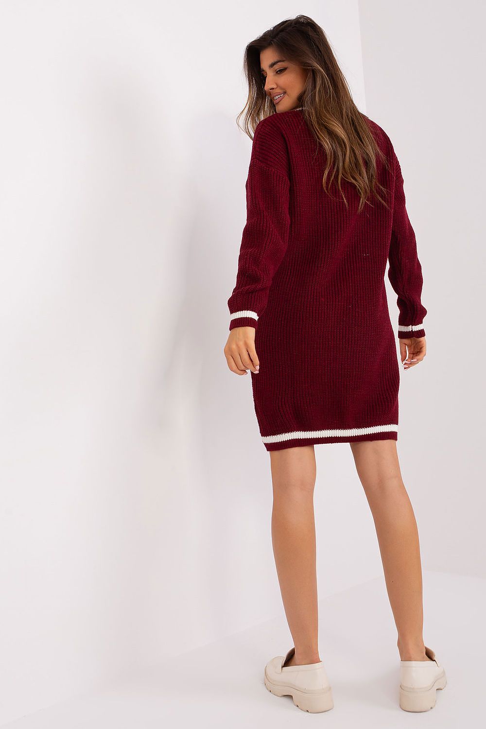 Beautifully draped oversized knit dress with heart neckline by Badu, ideal for both town outings and social gatherings.