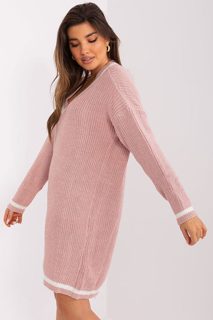 Comfortable and chic oversized knit dress from Badu with heart neckline detail, ideal for everyday luxury wear in a versatile design.