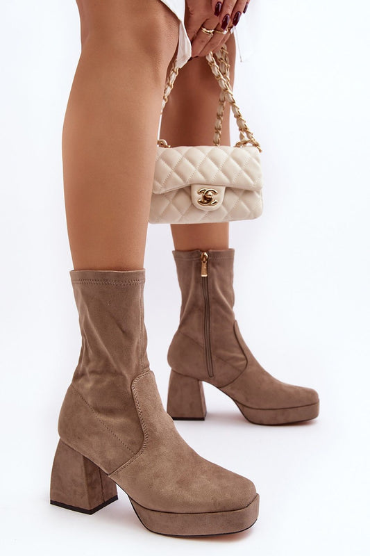Chic close-up of Women's Eco-Suede Ankle Boots by Step in Style, highlighting the luxurious square toe and eco-friendly materials.