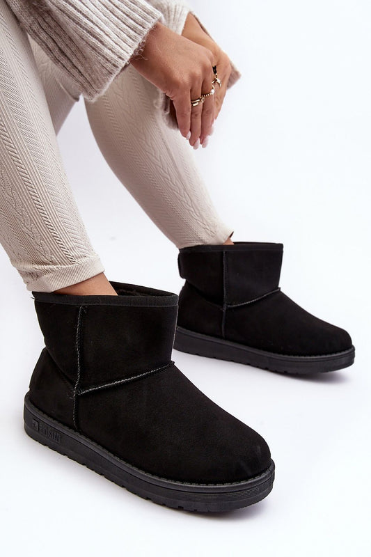 Close-up view of Step in Style's Luxury Eco-Suede Snow Boots showcasing luxurious fur lining and intricate detailing.
