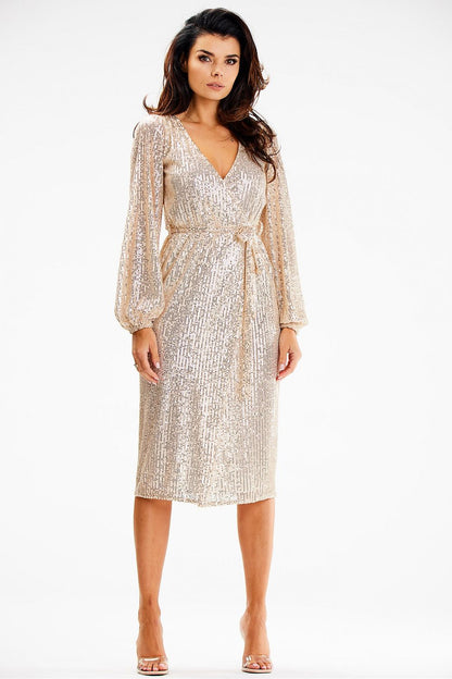 Fashion-forward Awama sequin envelope dress highlighting the crinkled elasticated sleeves and trendy ties for a chic finish.
