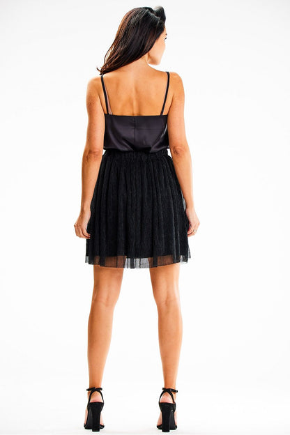 Stylish mini skirt by Awama, perfect for chic occasions, featuring a comfortable elastic waist and sophisticated design.