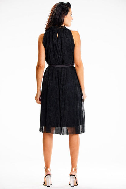 Close-up of Awama's luxurious satin belt and intricate collar design on a lightweight midi dress.