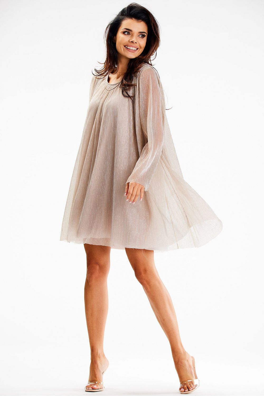 Close-up of the delicate mesh fabric of the Awama evening dress showcasing its shimmering elegance and luxurious satin lining.