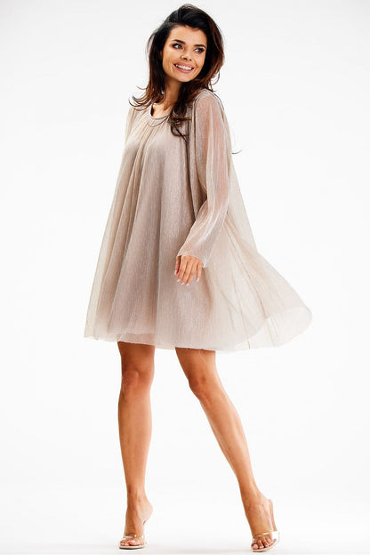 Close-up of the delicate mesh fabric of the Awama evening dress showcasing its shimmering elegance and luxurious satin lining.