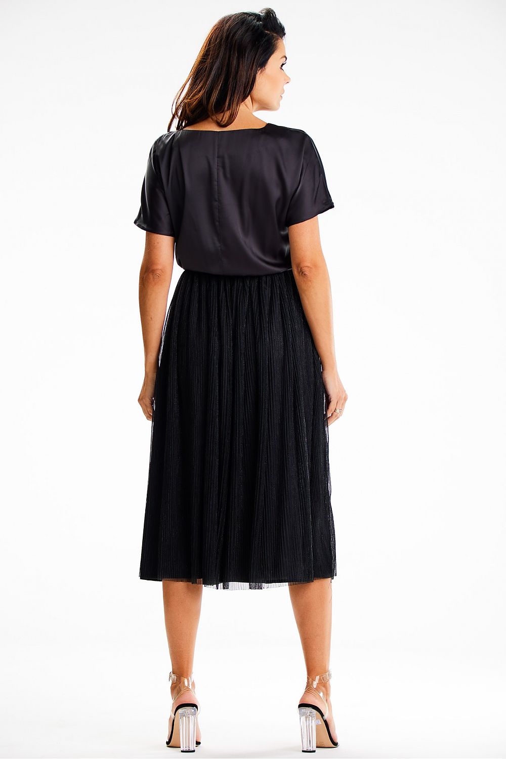 Model wearing the elegant Awama midi dress, highlighting its flattering silhouette and graceful flow.