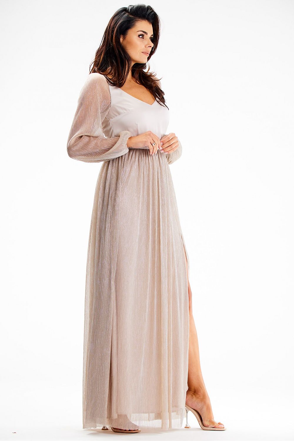 Elegant Awama maxi dress featuring a striking left leg slit, adorned with glittering mesh sleeves and a luxurious satin neckline, perfect for upscale events.
