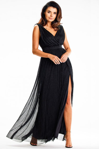 Stunning Awama Maxi Dress with a large neckline on the back, made from premium shiny mesh and satin, designed for glamorous night outings.