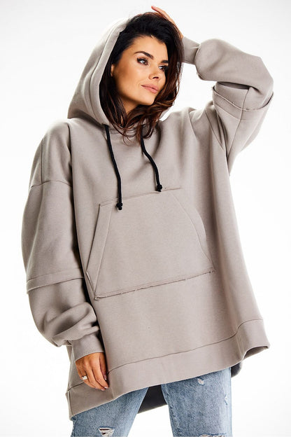 Stylish Infinite You hoodie designed for comfort with a soft cotton blend, showcasing a distinctive back patch and roomy front pocket.