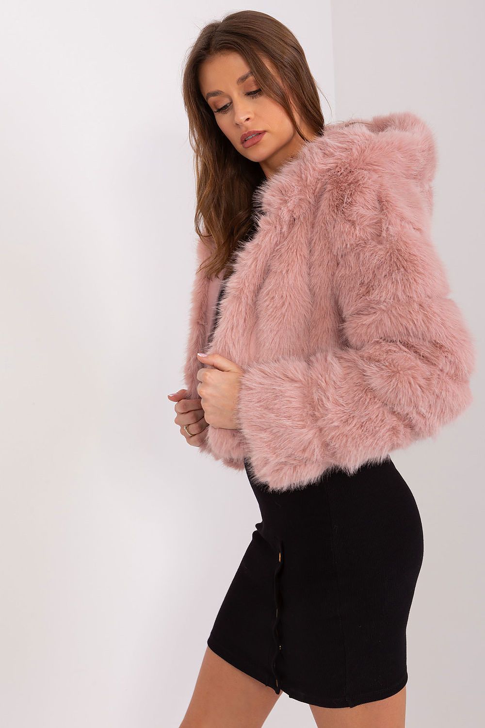 AT women's lightweight jacket with fur detailing, perfect for chilly weather, combining sophistication and comfort.