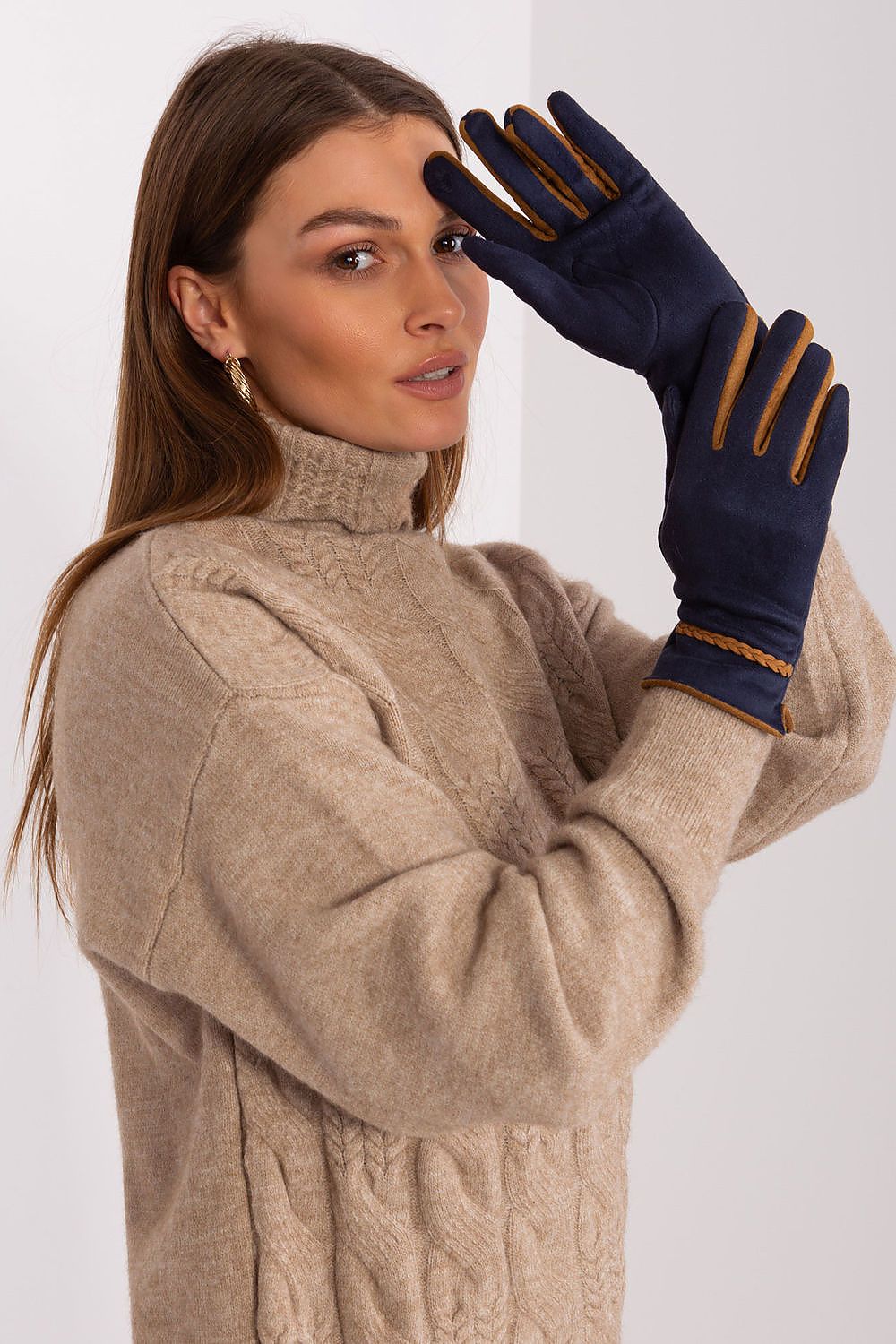 Luxury touchscreen gloves for women by AT with intricate braided wrist accents, designed for stylish smartphone use.