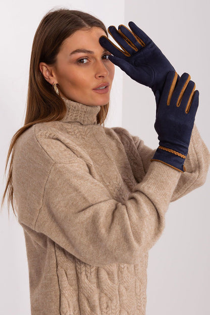 Luxury touchscreen gloves for women by AT with intricate braided wrist accents, designed for stylish smartphone use.