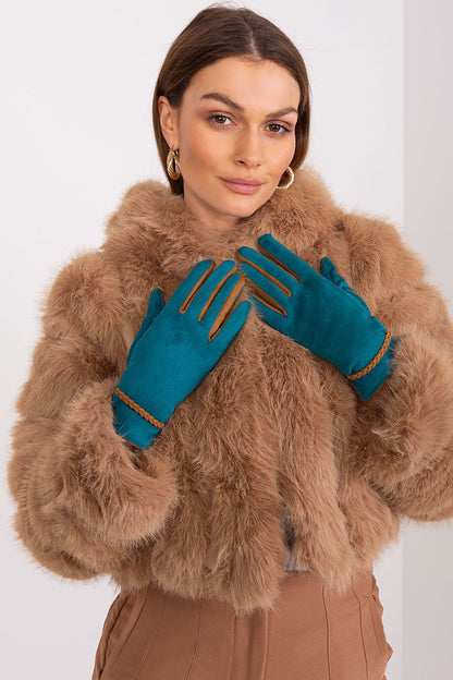 Luxury women's gloves by AT designed for smartphone use, highlighting floral embroidery and sophisticated braided wrist straps in a chic ensemble.