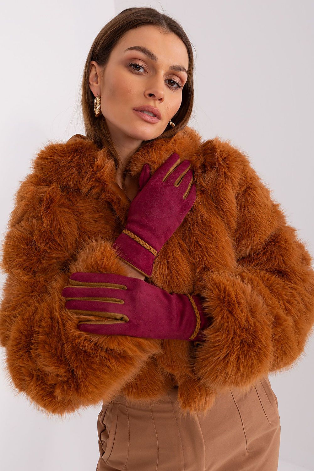 Luxurious women's touchscreen gloves by AT made with smooth material and contrasting inserts.