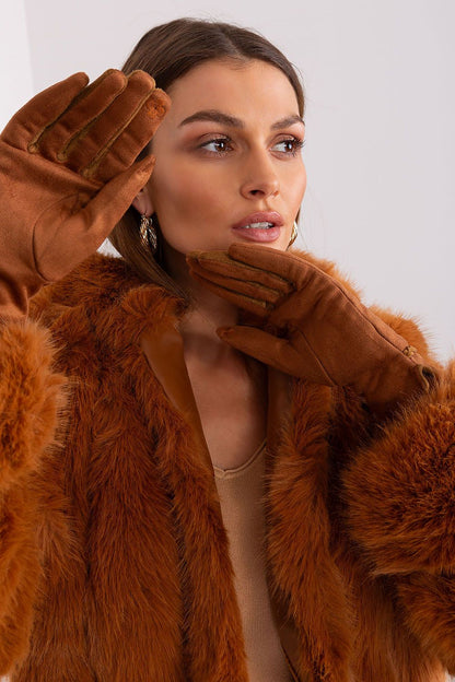 Close-up view of AT's luxurious women's touchscreen gloves, showcasing the intricate braided wrist straps and exquisite floral embroidery.