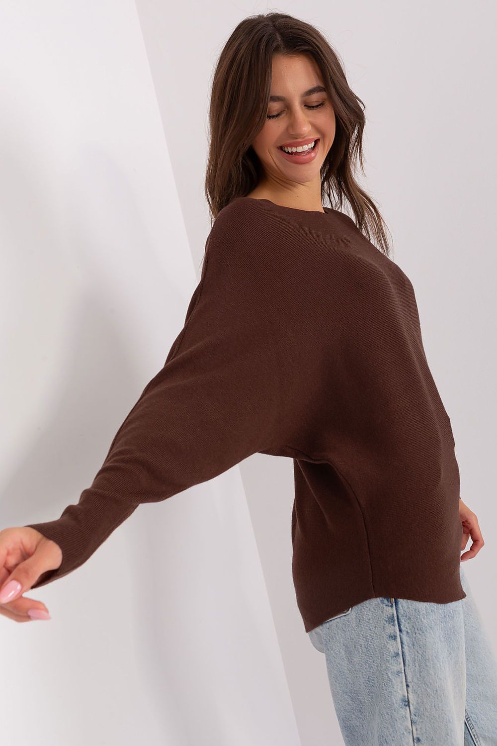 Close-up details of the Luxury Women's Batwing Sweater by Factory Price, showcasing the soft viscoelastic fabric and stylish loose fit.