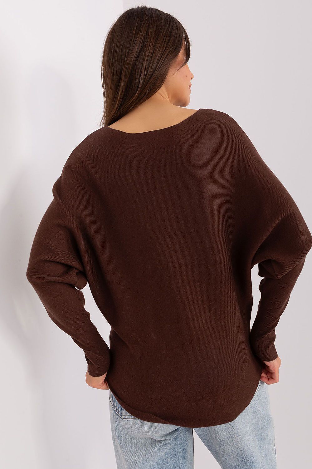 Style inspiration with Factory Price's Luxury Women's Batwing Sweater, demonstrating versatile outfit options for casual outings.
