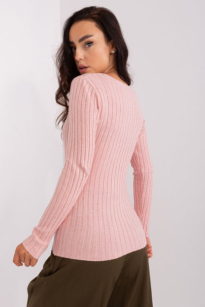 Model wearing a luxury ribbed viscose women's sweater with a V neckline, perfect for casual outings, styled by Factory Price.