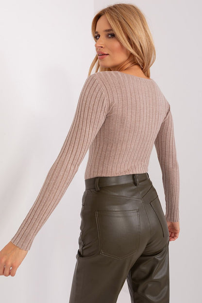 Elegant ribbed sweater featuring a deep V neckline, ideal for versatile casual styling, crafted from a soft viscose blend by Factory Price.