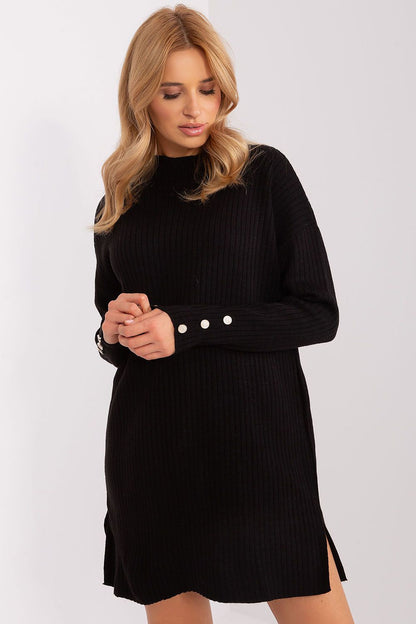 Luxurious oversized knitted dress by Factory Price, crafted from soft acrylic with a ribbed texture, perfect for casual winter outings.
