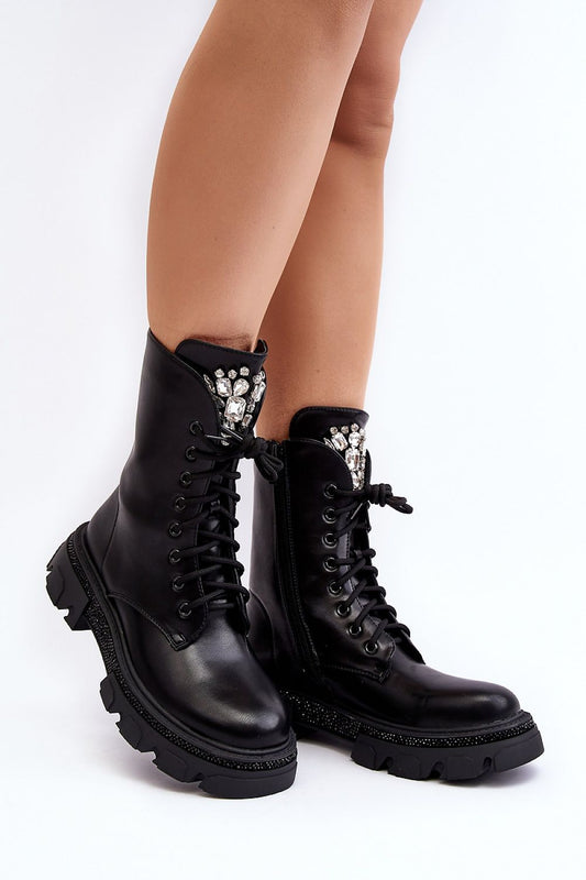 Elegant women's eco leather boots by Step in Style featuring insulated lining, lace-up design, and zipper closure. Perfect for cold weather with a stylish embellishment for luxury.