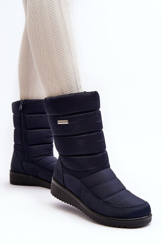 Women's luxurious insulated 21cm tall snow boots by Step in Style, featuring a plush fur lining and stable grooved sole, perfect for winter elegance.