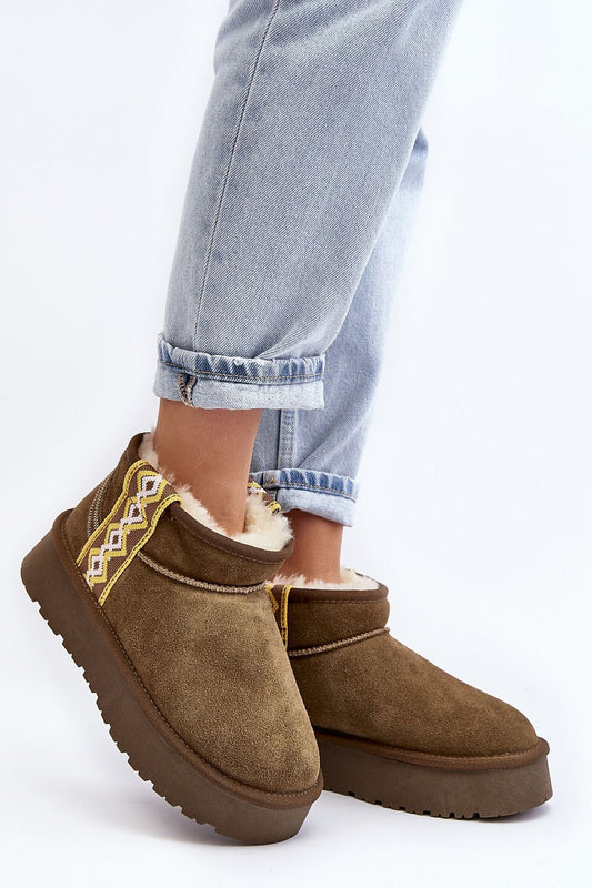 Luxury women's Aztec pattern snow boots designed by Step in Style, made from natural suede featuring a thick non-slip platform for optimal comfort and insulation.