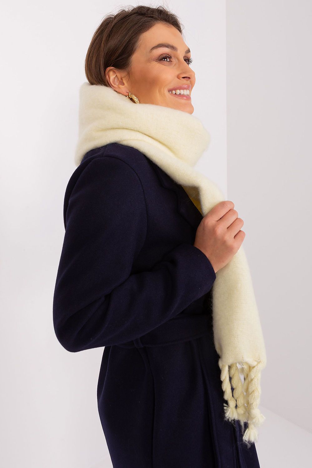 Elegant long scarf with tassels from AT, made of durable polyester, ideal for versatile styling in colder seasons.