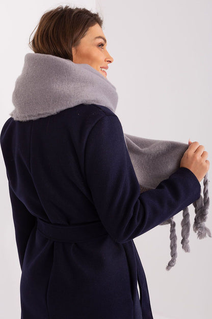 High-quality luxury scarf by AT, showcasing a smooth texture and versatility for different styles in cold weather.