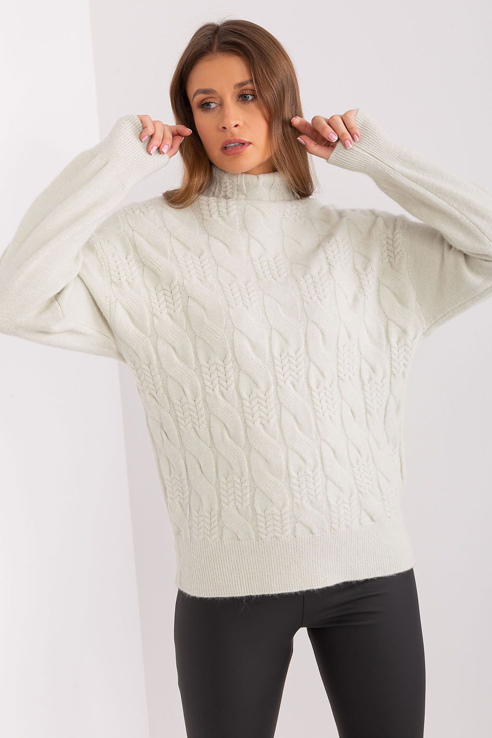Stylish acrylic turtleneck sweater by AT, featuring a classic design for both work and casual outings.
