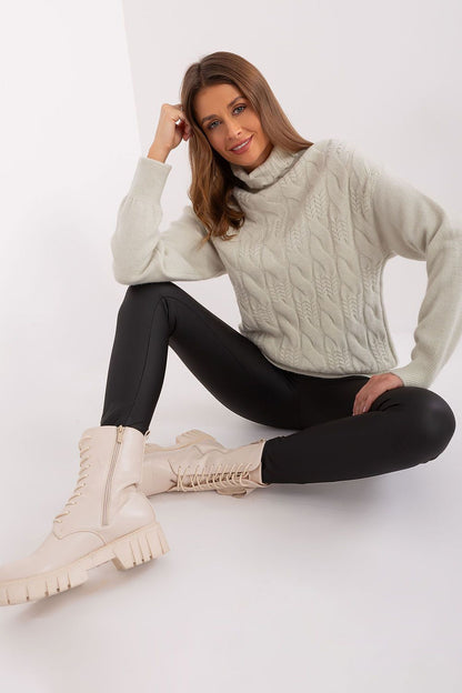 Luxurious variegated weave high-quality sweater from AT, combining warmth and elegance for cold days.