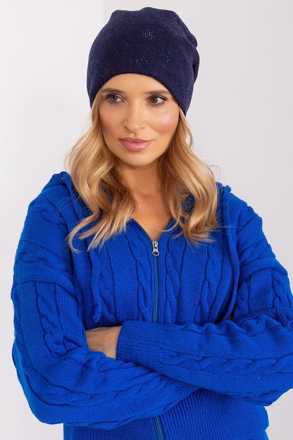 Stylish women's cashmere blend beanie hat featuring dazzling rhinestones, designed for warmth and luxury by AT.