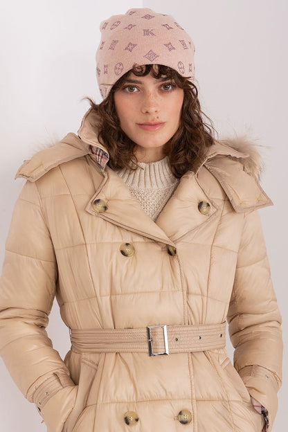 Elegant winter styling featuring the AT Women's Cashmere Blend Beanie Hat, adorned with chic rhinestones.