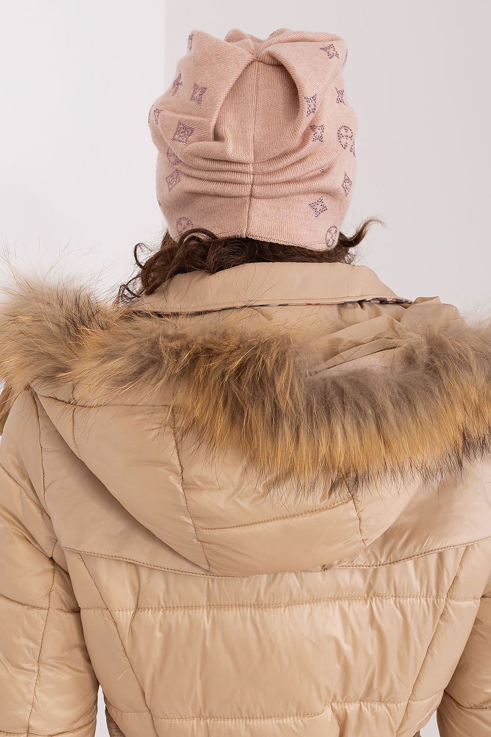 Close-up of AT cashmere blend beanie showcasing the exquisite rhinestone detailing and soft texture.