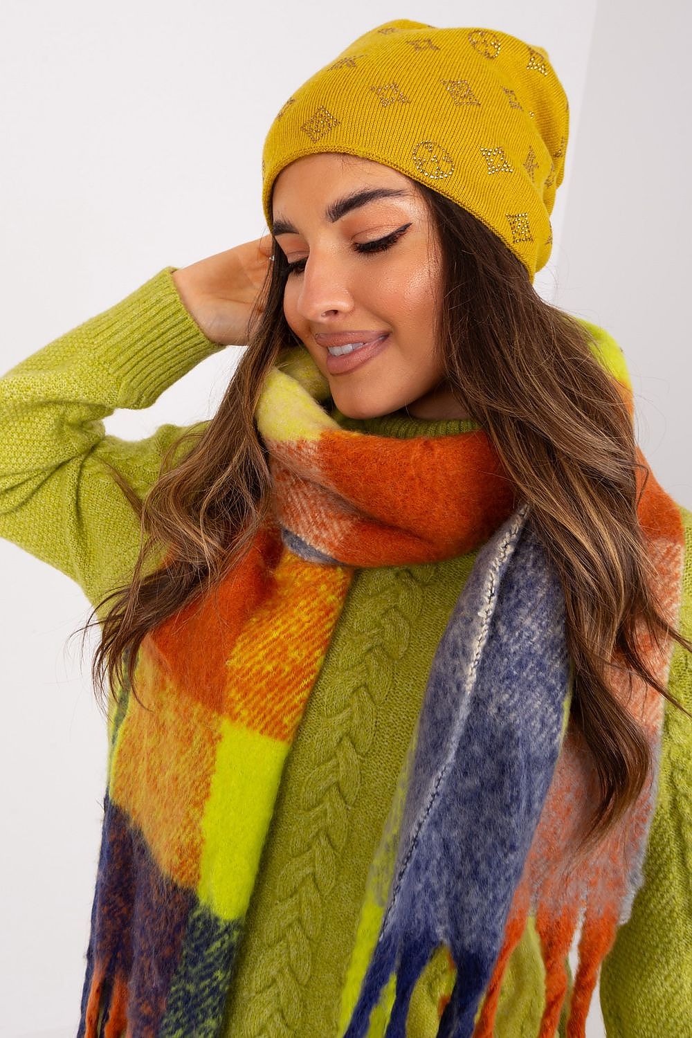 Warm and fashionable AT women's cashmere blend beanie, perfect for winter, featuring eye-catching rhinestones.