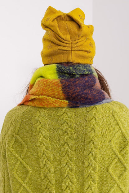 Luxurious women's cashmere blend beanie hat by AT adorned with elegant rhinestones, perfect for winter elegance.