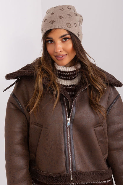 Stylish winter outfit featuring AT's luxurious women's cashmere blend beanie hat with rhinestones, a must-have accessory.